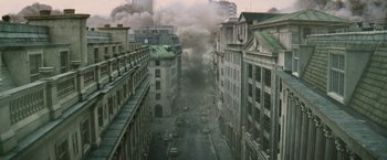 Movie still from “The Mummy” (2017), directed by Alex Kurtzman – A city street filled with lots of smoke and debris; Extreme Wide shot, High angle