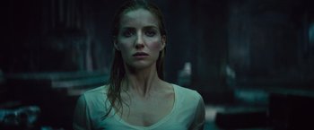 Movie still from “The Mummy” (2017), directed by Alex Kurtzman – A person wearing a white shirt; Close Up shot, Low angle