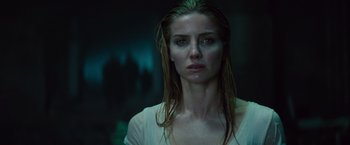 Movie still from “The Mummy” (2017), directed by Alex Kurtzman – A person with wet hair; Close Up shot, Low angle