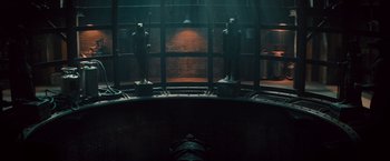 Movie still from “The Mummy” (2017), directed by Alex Kurtzman – A room filled with lots of lights and a large window; Extreme Wide shot, High angle