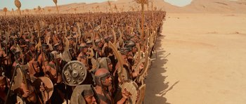 Movie still from “The Mummy Returns” (2001), directed by Stephen Sommers – A large group of people in ancient roman clothing; Extreme Wide shot, High angle