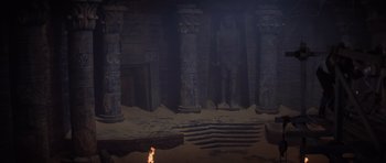 Movie still from “The Mummy Returns” (2001), directed by Stephen Sommers – An ancient egyptian temple is lit up by a candle; Extreme Wide shot, High angle