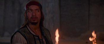 Movie still from “The Mummy Returns” (2001), directed by Stephen Sommers – A person wearing a hat; Close Up shot, Over the shoulder angle