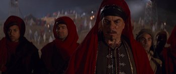 Movie still from “The Mummy Returns” (2001), directed by Stephen Sommers – Two men dressed up in medieval clothing; Medium shot, Low angle