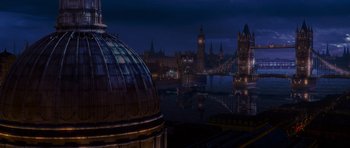 Movie still from “The Mummy Returns” (2001), directed by Stephen Sommers – A view of a city at night from a bridge; Extreme Wide shot, High angle