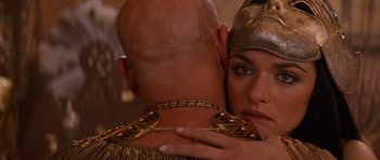 Movie still from “The Mummy Returns” (2001), directed by Stephen Sommers – A man and a woman embracing each other in front of a mirror; Close Up shot, Over the shoulder angle