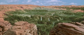 Movie still from “The Mummy Returns” (2001), directed by Stephen Sommers – An artistic rendering of a waterfall in the middle of the desert; Extreme Wide shot, High angle