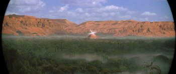 Movie still from “The Mummy Returns” (2001), directed by Stephen Sommers – An image of an image of a desert scene; Extreme Wide shot, High angle