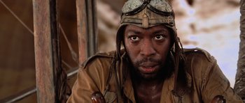 Movie still from “The Mummy Returns” (2001), directed by Stephen Sommers – A person wearing a helmet; Close Up shot, Low angle