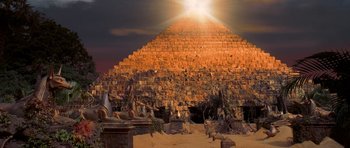 Movie still from “The Mummy Returns” (2001), directed by Stephen Sommers – The sun is shining on the top of a pyramid; Extreme Wide shot, Low angle