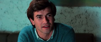 Movie still from “The New York Ripper” (1982), directed by Lucio Fulci – A person wearing a sweater; Close Up shot, Low angle