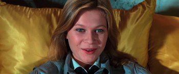 Movie still from “The New York Ripper” (1982), directed by Lucio Fulci – A woman's face with blue eyes; Close Up shot, High angle
