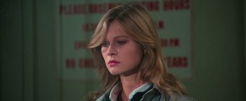 Movie still from “The New York Ripper” (1982), directed by Lucio Fulci – A person with long hair; Close Up shot, Low angle