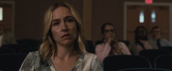 Movie still from “The Night House” (2020), directed by David Bruckner – A woman sitting in front of another woman in a room; Close Up shot, Over the shoulder angle