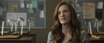 Movie still from “The Night House” (2020), directed by David Bruckner – A person with long red hair; Close Up shot, Over the shoulder angle