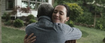 Movie still from “The Night House” (2020), directed by David Bruckner – A man and a woman hugging each other outside; Close Up shot, Over the shoulder angle