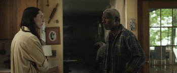 Movie still from “The Night House” (2020), directed by David Bruckner – An older man standing in front of a mirror; Medium shot, Over the shoulder angle