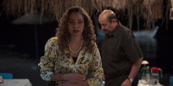 Movie still from “The Nightingale of Bursa” (2023), directed by Hakan Algül – A man and a woman standing next to each other; Medium shot, Over the shoulder angle