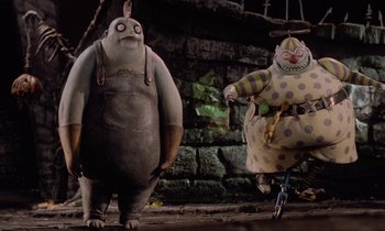 Movie still from “The Nightmare Before Christmas” (1993), directed by Henry Selick – A couple of people that are standing next to each other; Wide shot, Low angle