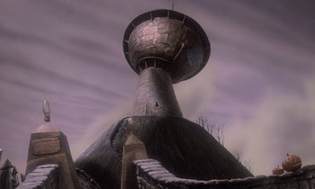 Movie still from “The Nightmare Before Christmas” (1993), directed by Henry Selick – A very tall building with a very unusual design; Extreme Wide shot, Low angle