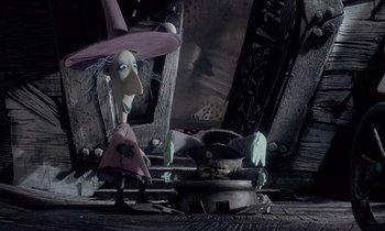 Movie still from “The Nightmare Before Christmas” (1993), directed by Henry Selick – A witch is standing in front of a pot of food; Medium shot, High angle