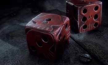 Movie still from “The Nightmare Before Christmas” (1993), directed by Henry Selick – A pair of red dice sitting next to each other on the ground; Extreme Close Up shot, High angle