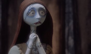 Movie still from “The Nightmare Before Christmas” (1993), directed by Henry Selick – A doll with a face of a woman; Close Up shot, Low angle