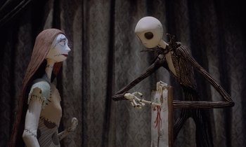 Movie still from “The Nightmare Before Christmas” (1993), directed by Henry Selick – A couple of people that are in a room; Medium shot, Low angle