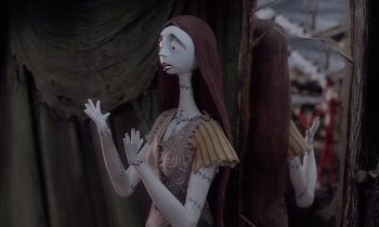 Movie still from “The Nightmare Before Christmas” (1993), directed by Henry Selick – A doll of the character sally from tim burtons movie the nightmare before christmas; Close Up shot, Low angle