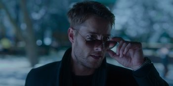 Movie still from “The Noel Diary” (2022), directed by Charles Shyer – A person wearing sunglasses; Close Up shot, Over the shoulder angle