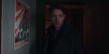 Movie still from “The Noel Diary” (2022), directed by Charles Shyer – A person wearing a coat; Close Up shot, Over the shoulder angle