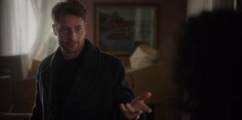 Movie still from “The Noel Diary” (2022), directed by Charles Shyer – A person wearing a coat; Close Up shot, Over the shoulder angle