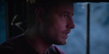 Movie still from “The Noel Diary” (2022), directed by Charles Shyer – A man's face in the dark; Close Up shot, Over the shoulder angle