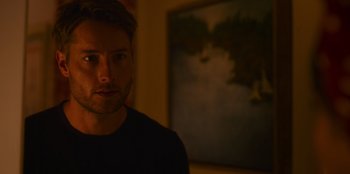 Movie still from “The Noel Diary” (2022), directed by Charles Shyer – A person in front of a painting; Close Up shot, Over the shoulder angle