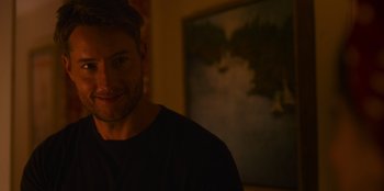 Movie still from “The Noel Diary” (2022), directed by Charles Shyer – A person smiling at the camera; Close Up shot, Over the shoulder angle