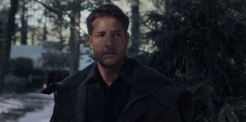 Movie still from “The Noel Diary” (2022), directed by Charles Shyer – A person wearing a jacket near a forest; Close Up shot, Over the shoulder angle