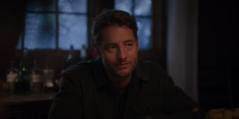 Movie still from “The Noel Diary” (2022), directed by Charles Shyer – A person sitting in front of a window; Close Up shot, Over the shoulder angle