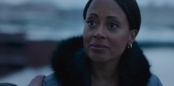 Movie still from “The Noel Diary” (2022), directed by Charles Shyer – A person wearing a jacket; Close Up shot, Over the shoulder angle