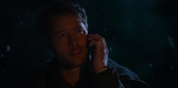 Movie still from “The Noel Diary” (2022), directed by Charles Shyer – A person talking on a cell phone; Close Up shot, Over the shoulder angle
