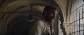 Movie still from “The Nun II” (2023), directed by Michael Chaves – A man standing in a room with his mouth open; Close Up shot, Low angle