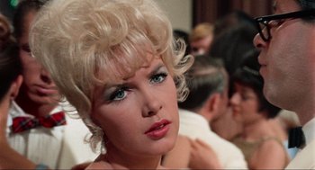 Movie still from “The Nutty Professor” (1963), directed by Jerry Lewis – A person with blonde hair and blue eyes; Close Up shot, Low angle