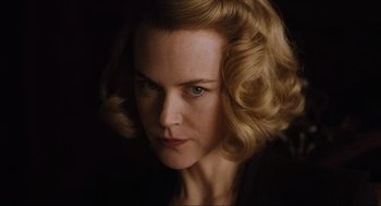 Movie still from “The Others” (2001), directed by Alejandro Amenábar – A person with blonde hair; Close Up shot, Low angle