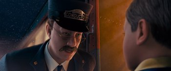 Movie still from “The Polar Express” (2004), directed by Robert Zemeckis – A man in a conductor's hat and tie; Close Up shot, Low angle