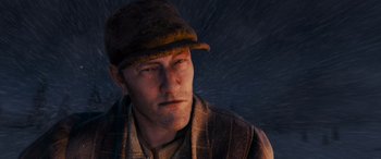 Movie still from “The Polar Express” (2004), directed by Robert Zemeckis – A person wearing a hat; Close Up shot, High angle