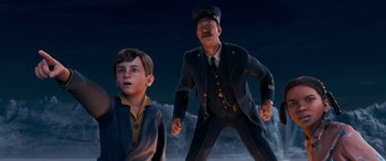 Movie still from “The Polar Express” (2004), directed by Robert Zemeckis – An animated scene of a man and a boy; Medium shot, High angle