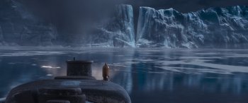 Movie still from “The Polar Express” (2004), directed by Robert Zemeckis – A fire hydrant sitting in front of a body of water; Extreme Wide shot, High angle