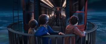 Movie still from “The Polar Express” (2004), directed by Robert Zemeckis – A group of people standing on a train platform; Medium shot, High angle