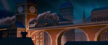 Movie still from “The Polar Express” (2004), directed by Robert Zemeckis – A train traveling over a bridge in the middle of the night; Extreme Wide shot, Low angle