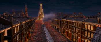 Movie still from “The Polar Express” (2004), directed by Robert Zemeckis – An image of a train going down the tracks at christmas time; Extreme Wide shot, High angle