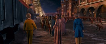 Movie still from “The Polar Express” (2004), directed by Robert Zemeckis – A group of people standing in front of a building; Extreme Wide shot, High angle